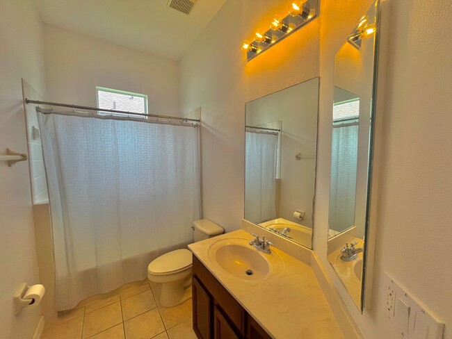 Building Photo - Spacious 4-Bed, 3-Bath Home in Guard-Gated...