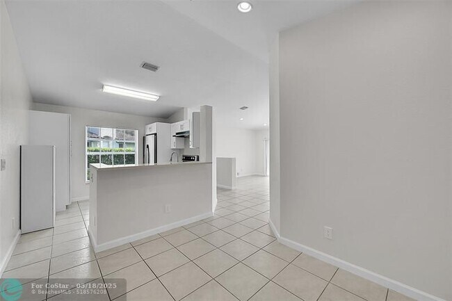 Building Photo - 5642 NW 118th Dr
