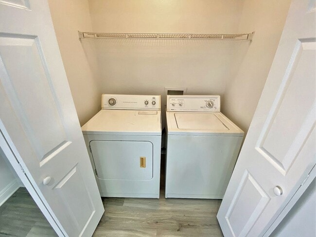 Building Photo - CONDOMINIUM IN A GATED COMMUNITY WITH 2 BE...