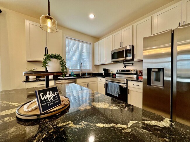 Building Photo - Beautiful NEW Ranch Home with a large deck & games