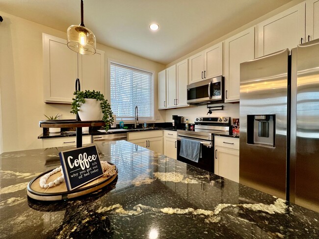 Building Photo - Beautiful NEW Ranch Home with a large deck...