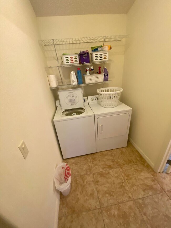 Building Photo - SEASONAL RENTAL. Large 4 Bed + 4 1/2 Baths Home, w/Views of the Jacaranda Golf Course and Lake in...