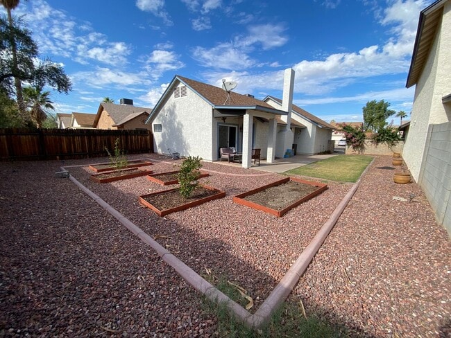 Building Photo - Quaint Retreat: 2BR/2BA Haven with Private Yard, Vaulted Ceilings & Cozy Fireplace