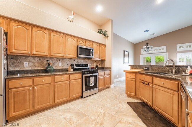 Building Photo - 5581 Exotic Rosette Ave