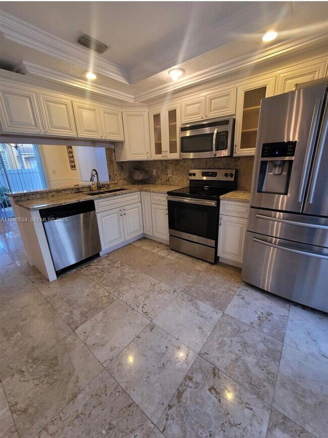 Building Photo - Northwest 13th Street, Pembroke Pines, FL 33026 - 3 BR 2.5 BA single-family home
