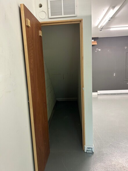 Extra storage under stairs in garage - 407 McCauley St