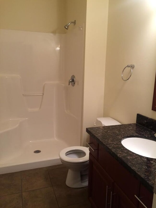 Building Photo - Live Large in This Spacious 2BR Townhome –...
