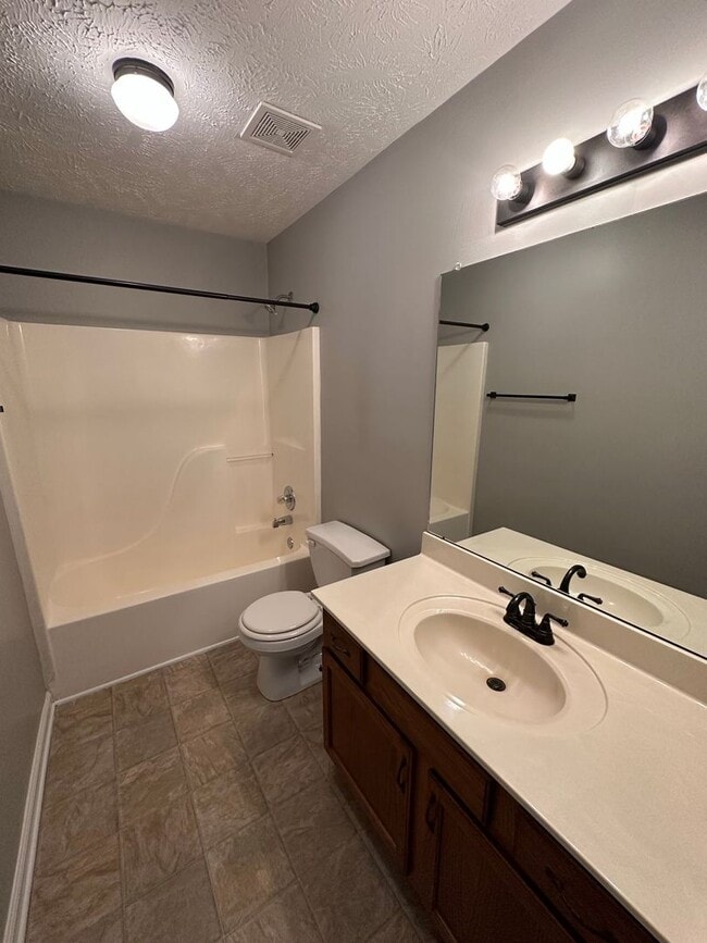 Building Photo - 1009 Bobcat Dr