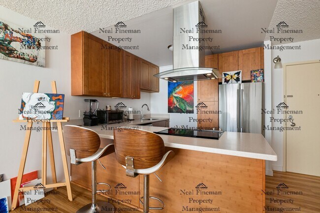 Building Photo - Unfurnished  1 Bed / 1 Bath Condo. 1 assigned covered parking stall. Rent Includes: AC Central, C...