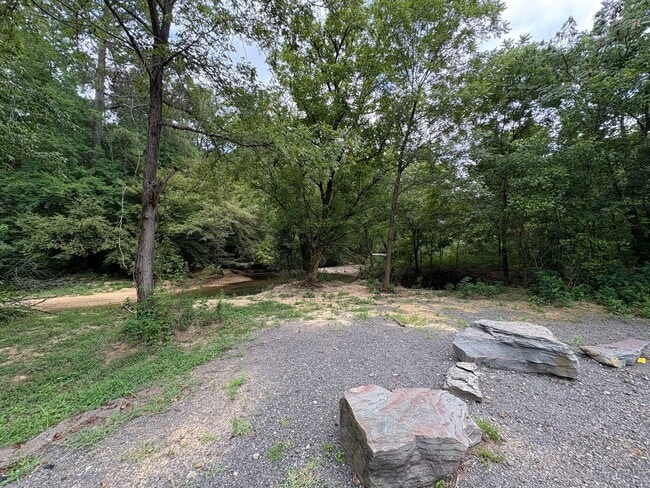 Building Photo - Four Bedroom Townhome Available Now