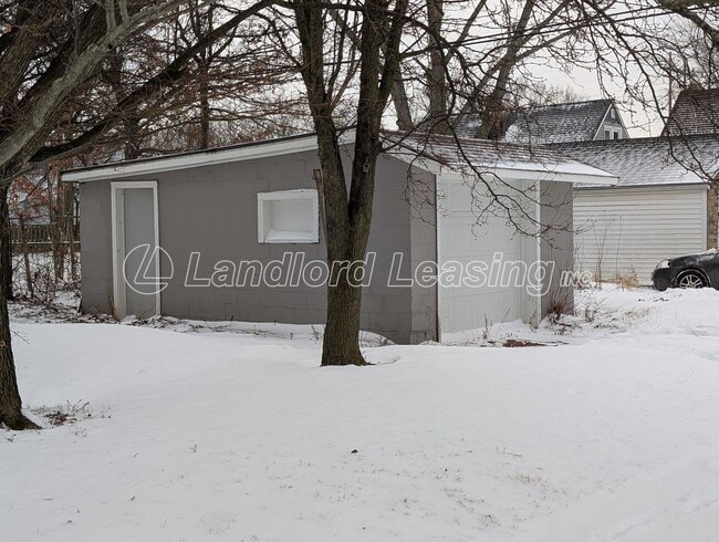Building Photo - Well-Maintained Cape Cod with Garage on Corner Lot