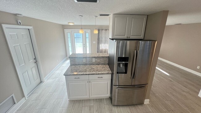 Building Photo - IMMACULATE 4 Bedroom, 2 Bathroom Home in Cocoa Beach!! ONLY MINUTES from the Beach!! (Lawn Care I...