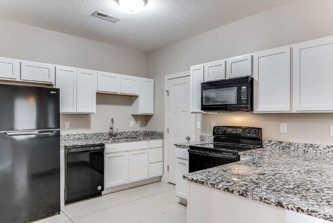Building Photo - "Charming 3-Bedroom Duplex Retreat with 2 Full Baths in Wichita – 1190 Sq Ft of Comfort!"