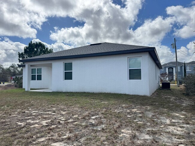 Building Photo - Spacious 4-Bedroom Home in Poinciana – Internet Included & No HOA Approval Required