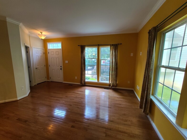 living room and front door - 832 Rock Creek Rd