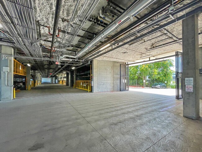 Building Photo - Modern 2BD Fremont Condo – EV Charger, Bal...