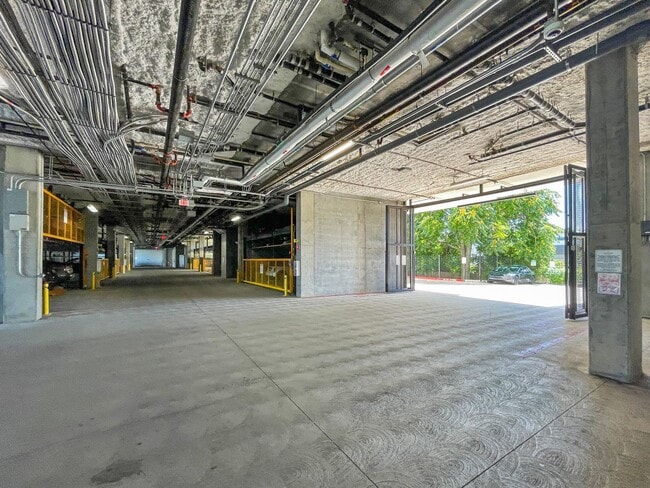 Building Photo - Modern 2BD Fremont Condo – EV Charger, Balcony, & Walk to BART