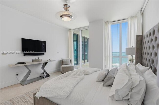 Building Photo - 10295 Collins Ave