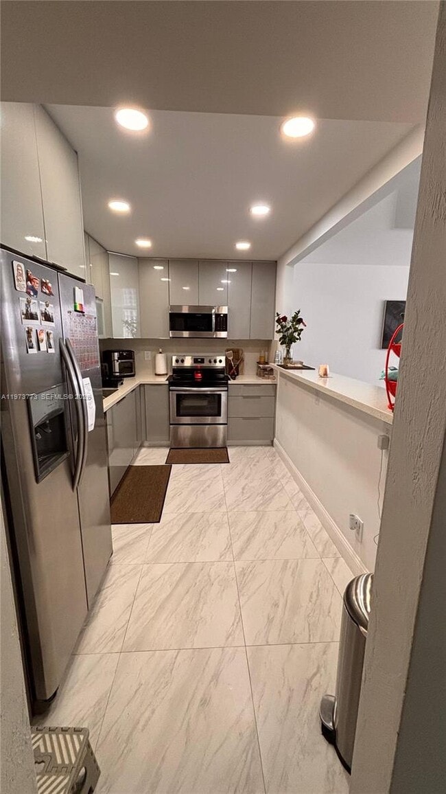 Building Photo - 19390 Collins Ave