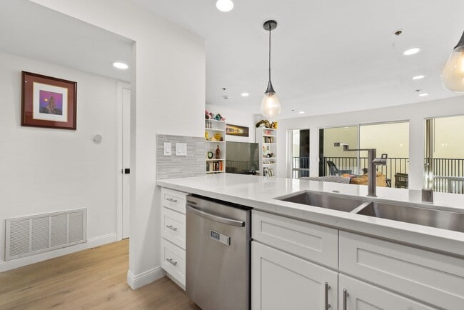 Building Photo - Modern Living Meets Urban Charm in Bankers...