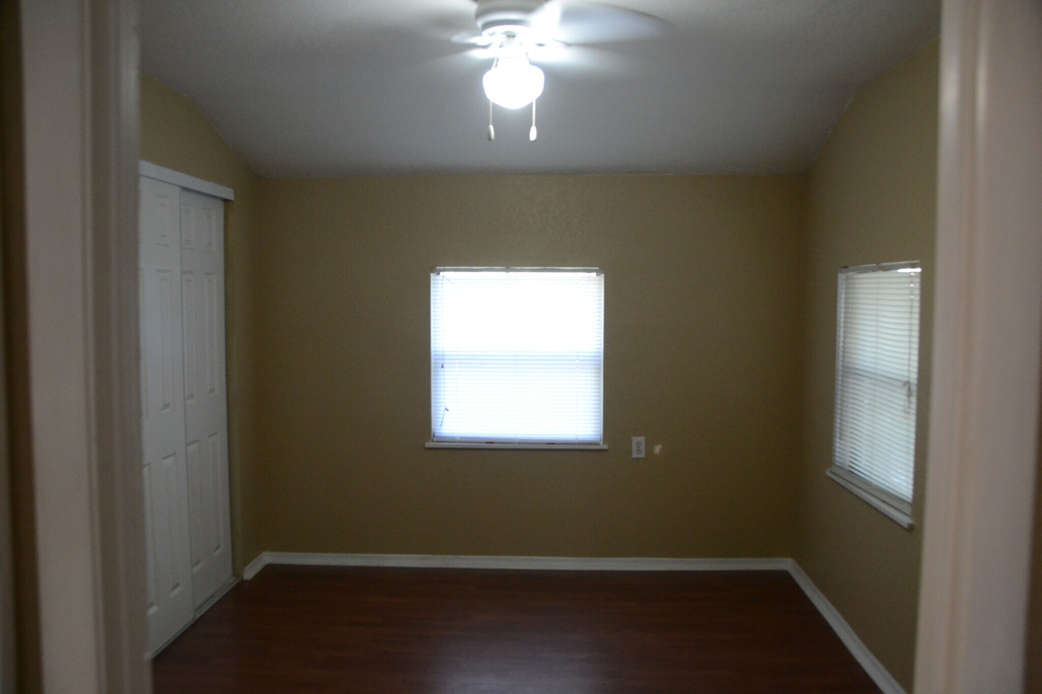 Bed room with an exit door to patio. - 817 Bay Street