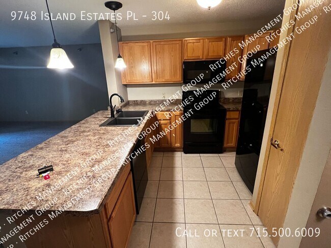 Building Photo - 9748 Island Estates Pl