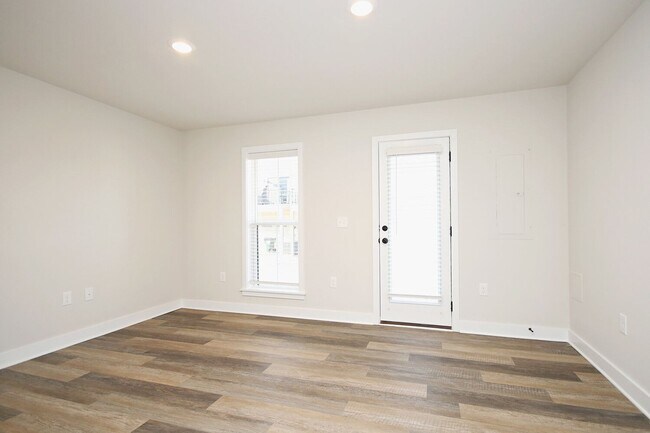 Building Photo - Dog-Friendly Old Trail Townhome - Walk To Local Shops, Restaurants, & More!