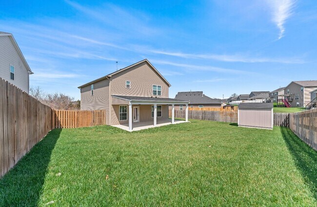 Building Photo - 4-Bedroom with Fenced Yard