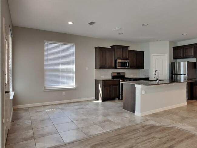 Building Photo - 5BR/4BA | Updated Single Family Home | 2-Car Garage | Gated backyard