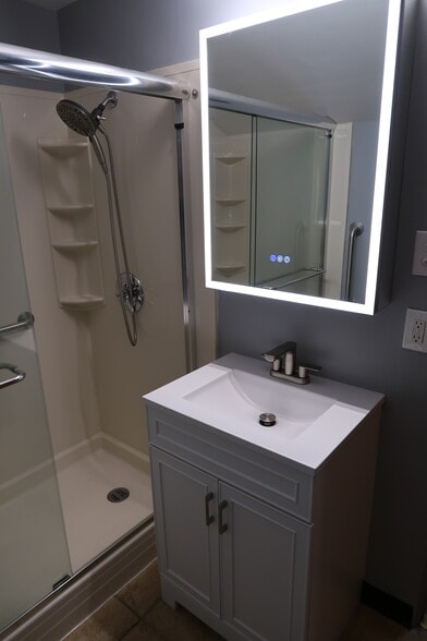 Vanity mirror with included dimmable lighting and de-fogging feature - 1714 Fair Acres Ave