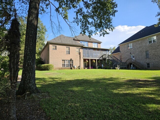 Building Photo - Lake Front Luxury in Chapin!
