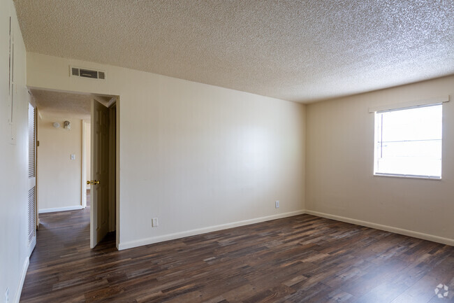 3BR, 1BA-1000SF, Living Room - Flint Garden Apartments