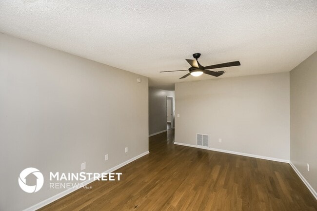 Building Photo - 7969 Sweet Rose Ln E