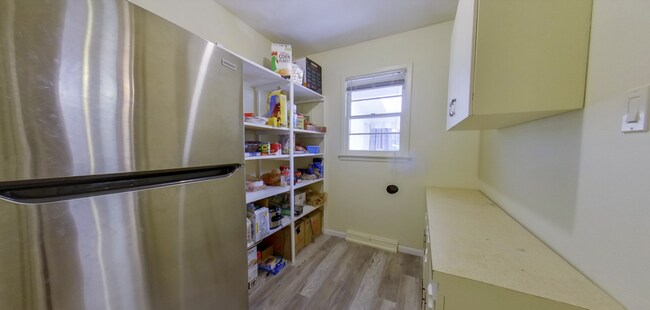 Building Photo - 3D Tour Available! West Side Home + Sunroom + Attached Garage + Pets Welcome + Washer & Dryer!  A...