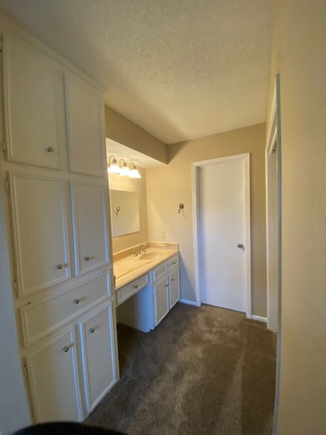 Building Photo - Come and view this open floor plan with much potential. Formal and dining room, granite counters,...