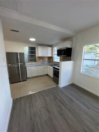 Building Photo - 8900 NW 25th Ave