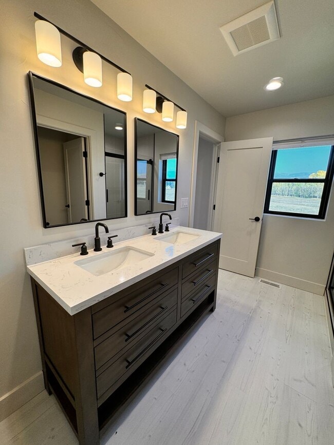Building Photo - Modern, Spacious 3-Bedroom Townhome in the...