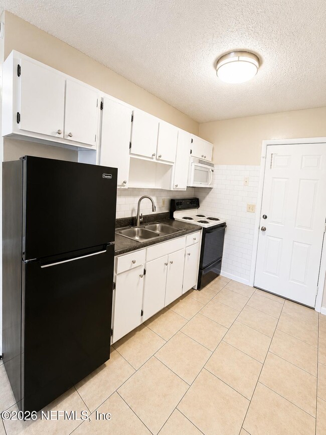 Building Photo - 8067 Parental Cir