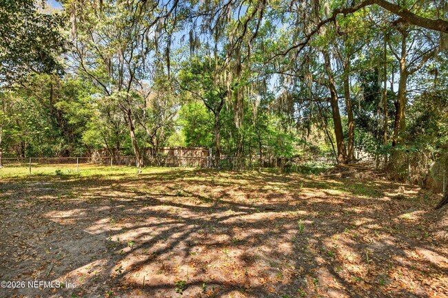 Building Photo - 6955 Miss Muffet Ln S