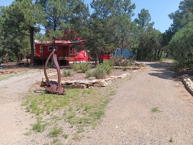 Building Photo - COZY HOME IN THE BEAUTIFUL TOWN OF TIJERAS | Showings available NOW!!