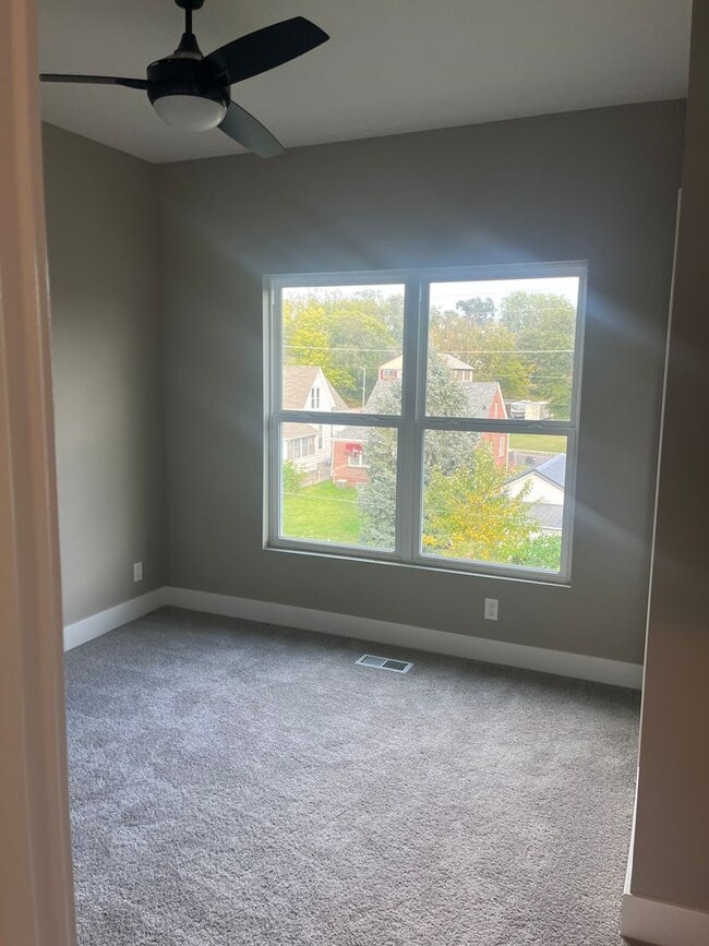 Building Photo - New Construction, 2 bed, 3 bath Row Home, with 2 car garage, fireplace, and rooftop deck!