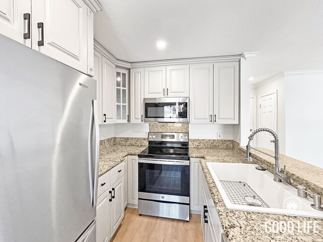 Building Photo - Beautifully Updated 2B 1.5BA Condo w/ Reserved Parking!