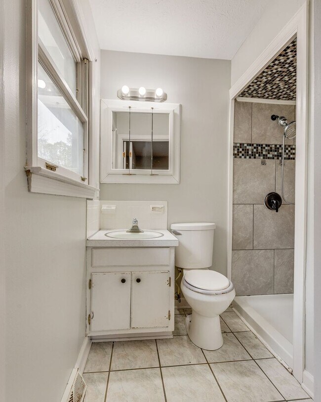 Building Photo - Spacious 3-Bedroom Home with Finished Base...