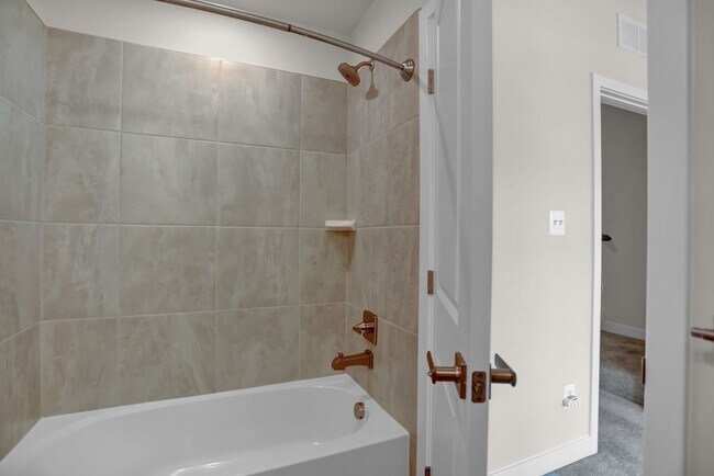 Building Photo - Luxury 4-Story Townhome with Rooftop Terrace!