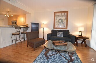 Building Photo - Charming Furnished Studio with Large Patio...