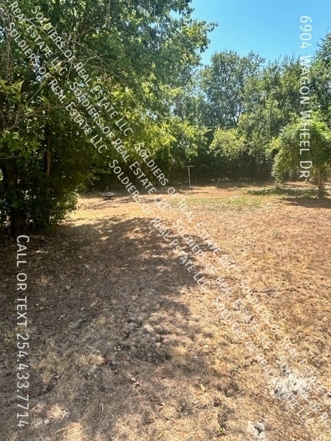 Building Photo - 6904 Wagon Wheel Dr