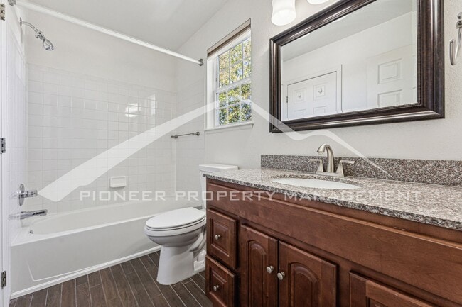 Building Photo - Spacious Home with Fenced Yard and Central AC