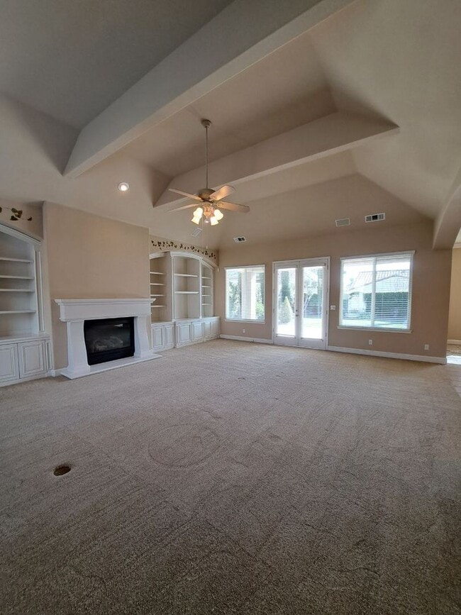 Building Photo - Custom Clovis Residence in Gated Community | Spacious Layout & 3-Car Garage!