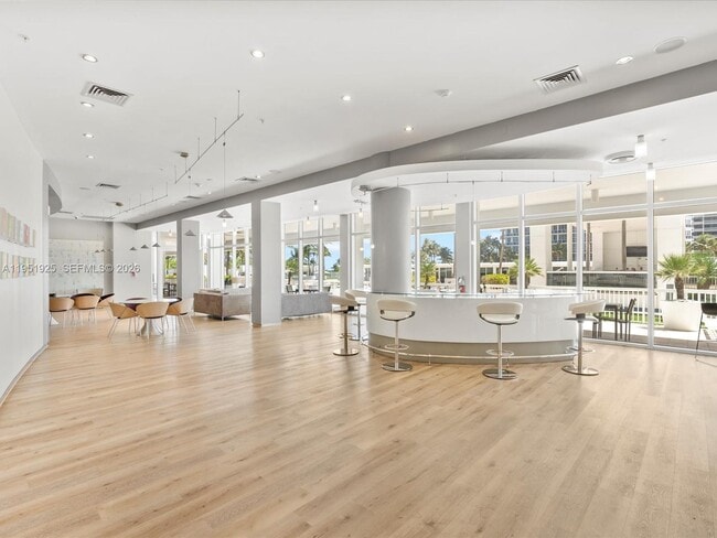 Building Photo - 10275 Collins Ave