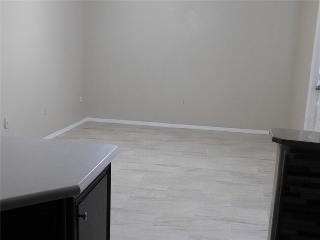 Building Photo - "Charming 1-Bedroom with Granite Touches in Port Charlotte!"